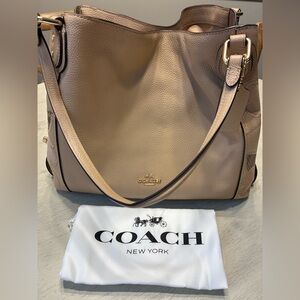 Coach Beige Leather Shoulder Bag. I would call it more of a tan and brown color.